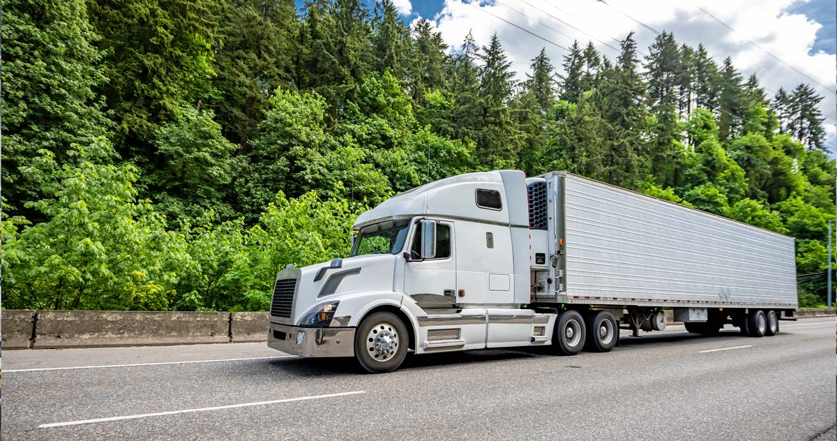 Heavy duty truck driving on a road